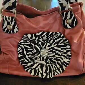 Zebra print on mauve handbag